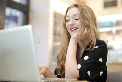 woman enjoying online training